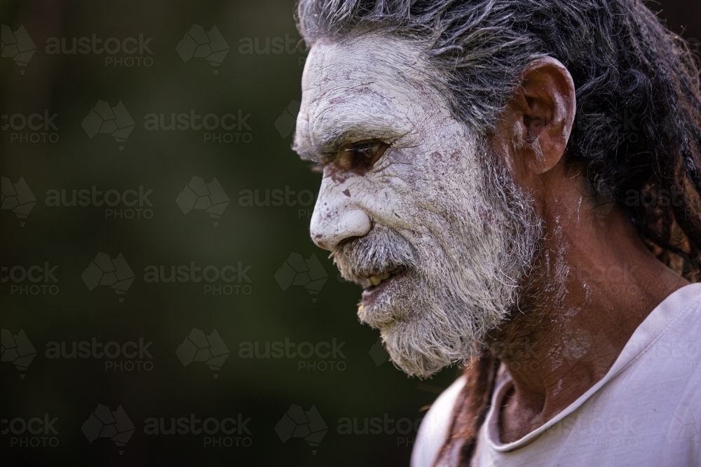 Aboriginal man wearing white face paint - Australian Stock Image
