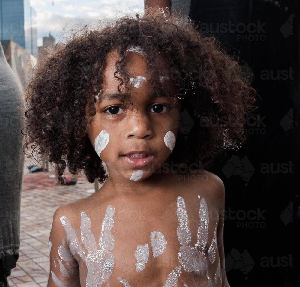 Aboriginal Preschooler with Traditional Paint - Australian Stock Image