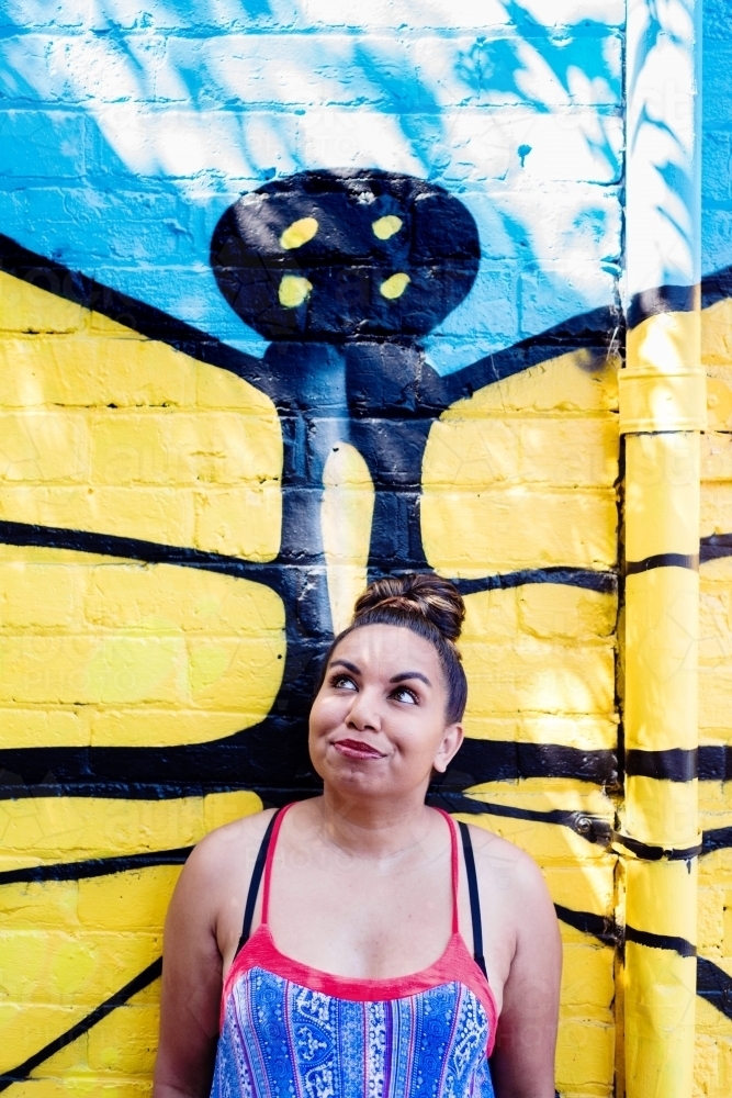 aboriginal woman looking up - Australian Stock Image
