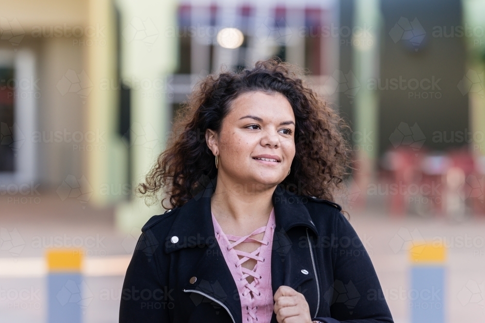 aboriginal woman on uni campus - Australian Stock Image