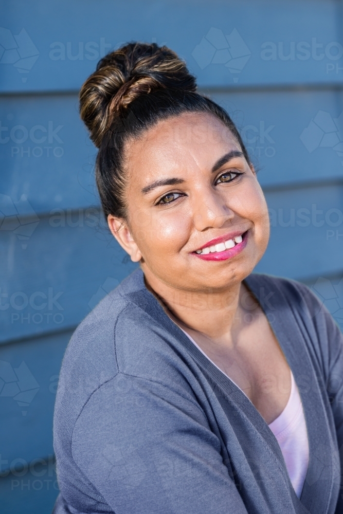 aboriginal woman outside home, (these images not suitable for sensitive use) - Australian Stock Image