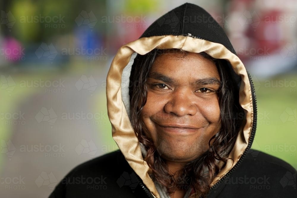 Aboriginal Woman Smiling and Looking at Camera - Australian Stock Image