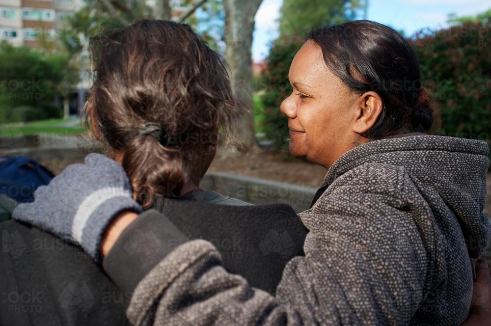 Aboriginal Woman with Her Arm around Another - Australian Stock Image