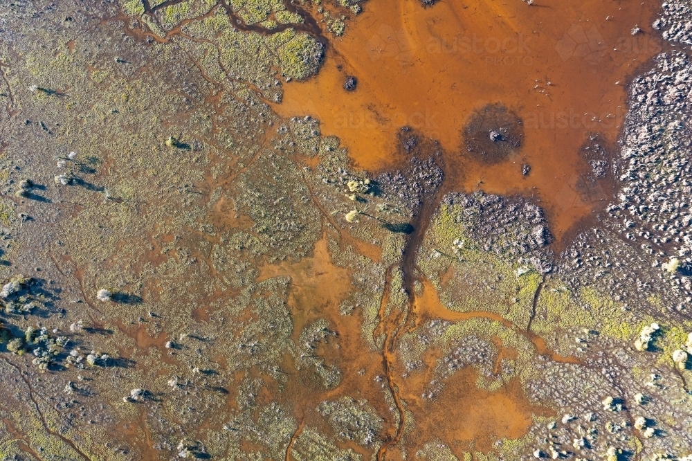 abstract aerial image looking down on swampy ground - Australian Stock Image