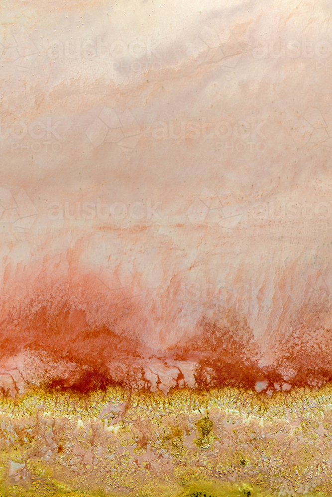 Abstract aerial view of mineral deposits and textures at the edge of a salt lake - Australian Stock Image