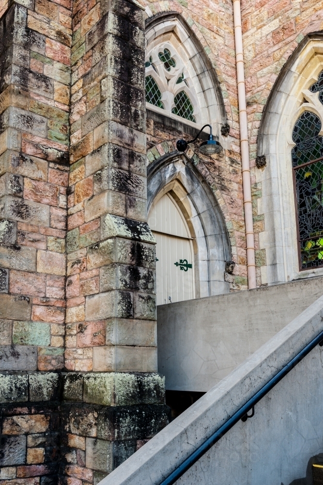 abstract of church exterior with curved doorway - Australian Stock Image
