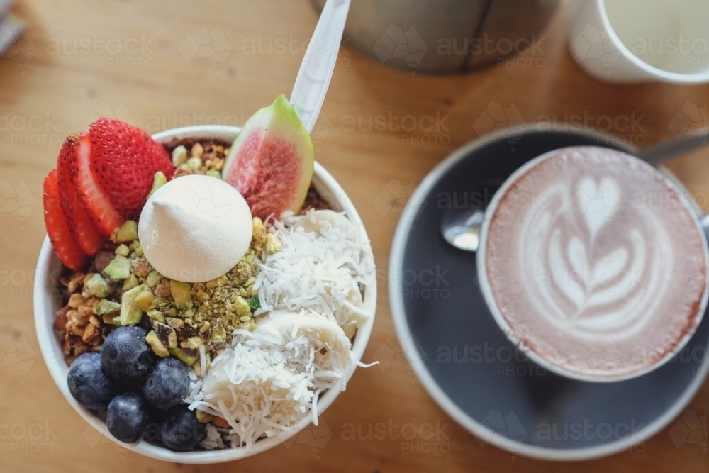 Acai bowl and cup of hot chocolate - Australian Stock Image