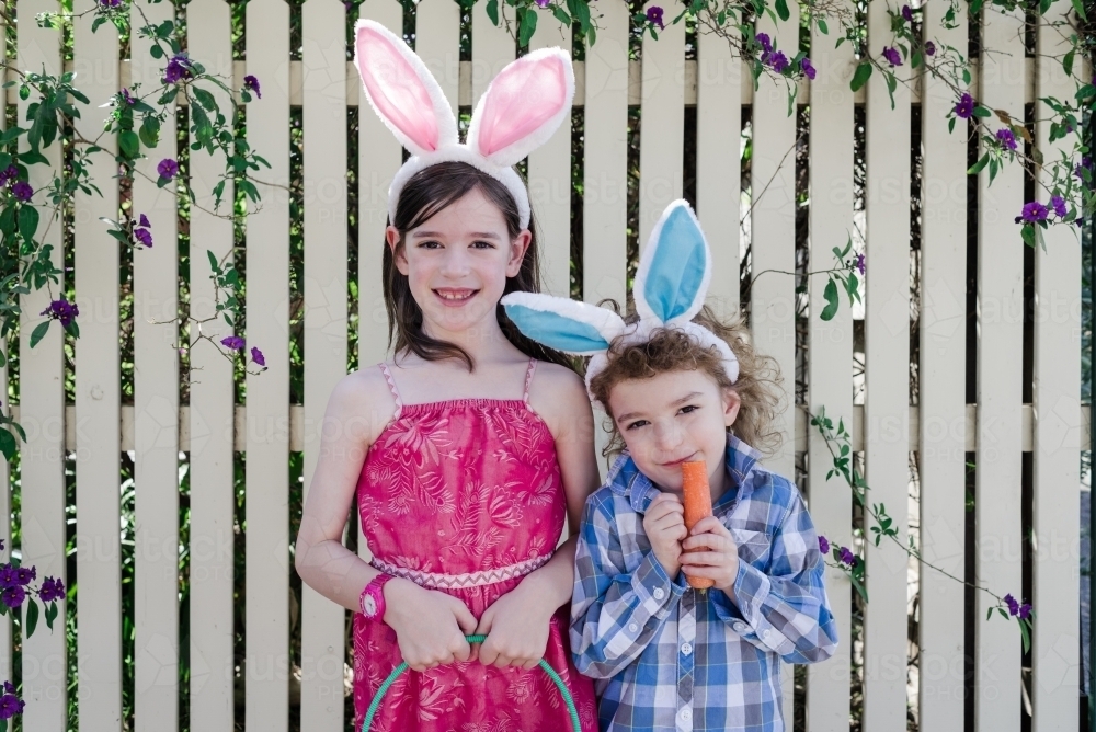 Adorable children wearing easter bunny rabbit ears - Australian Stock Image