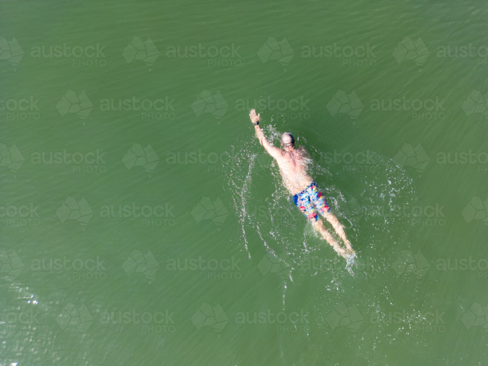Aerial image of an open water swimmer off Suttons Beach, Redcliffe - Australian Stock Image