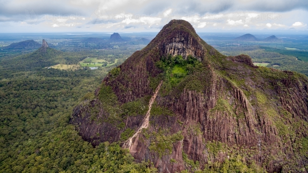 Aerial image of Mount Beerwah and other Glasshouse Mountains on the Sunshine Coast, QLD - Australian Stock Image