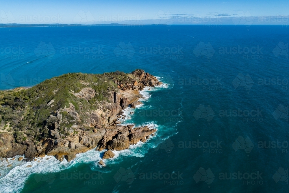 Aerial image of Round Hill headland, and Bustard Bay lookout, at the Town of 1770, QLD. - Australian Stock Image