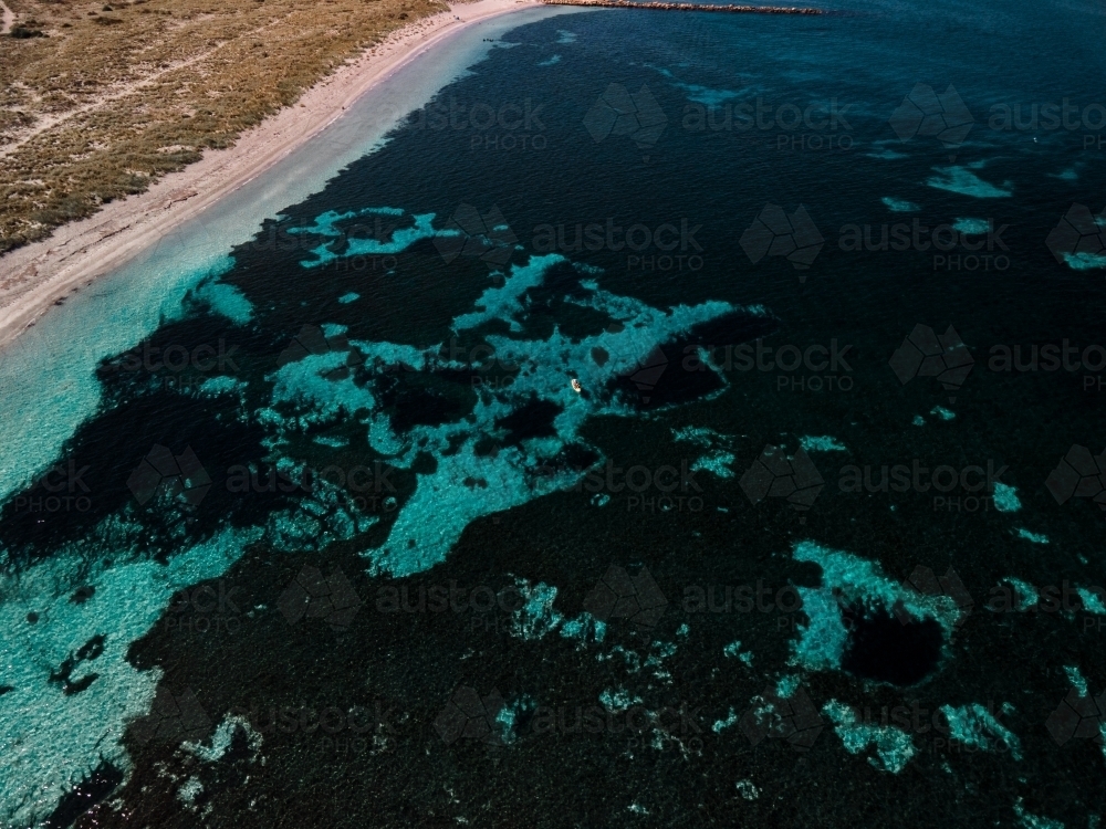 Aerial image of shallow reef surrounding Woodman Point - Australian Stock Image