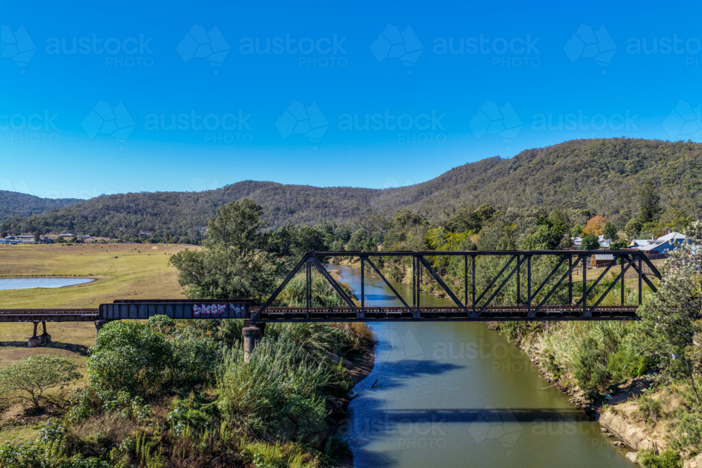 Aerial image of the Paterson railway bridge spanning the Hunter River in New South Wales Australia. - Australian Stock Image