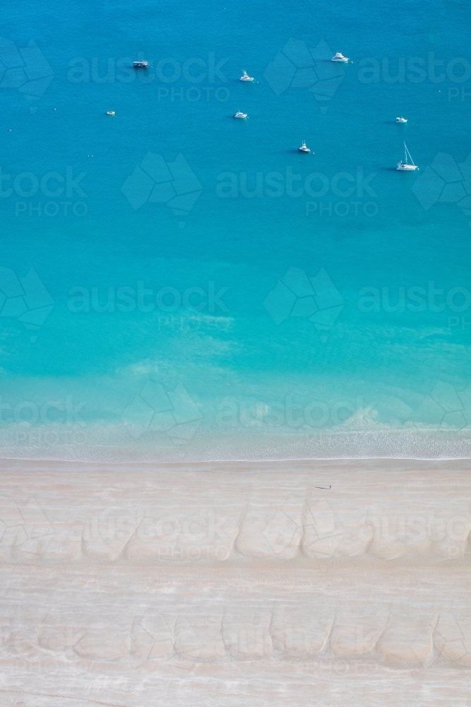 Aerial image of turquoise water and boats at Gantheaume Point - Australian Stock Image