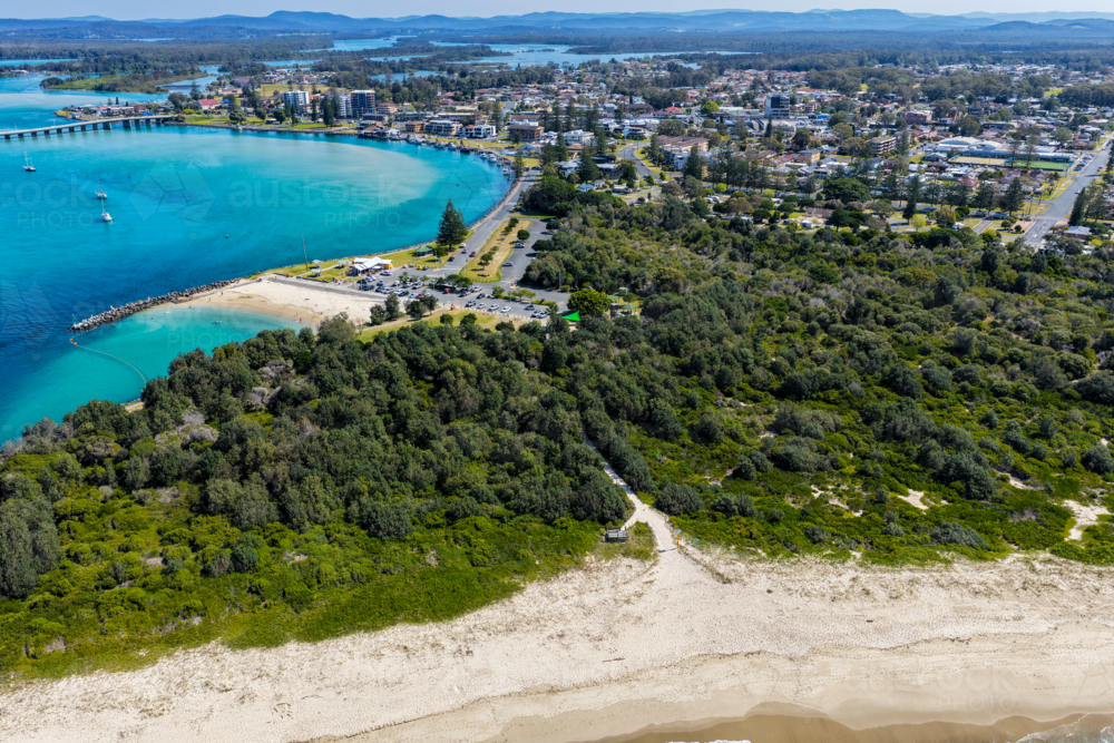 Aerial image showcasing Tuncurry Beach shoreline and the distinctive ocean Rockpool - Australian Stock Image