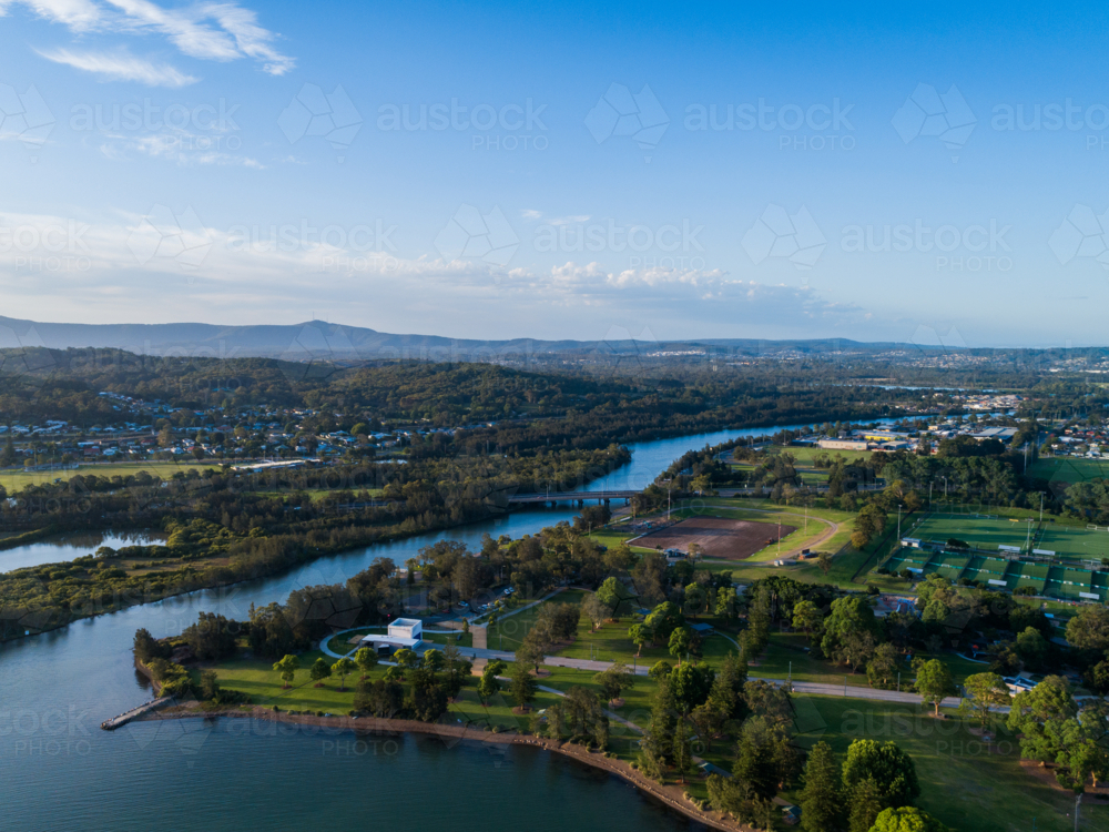 Aerial landscape view of Cockle Creek with five islands road passing across Newcastle - Australian Stock Image