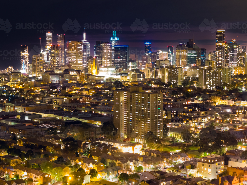 Aerial night time view of colourful lights of a city skyline at Melbourne in Victoria - Australian Stock Image