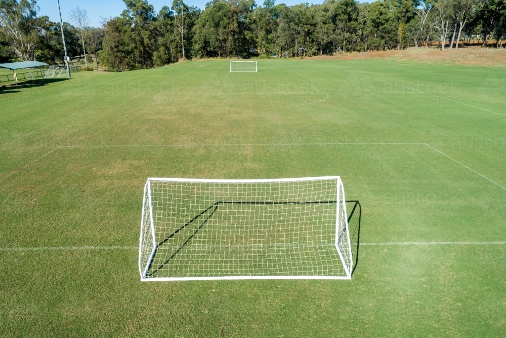 Aerial oblique view of soccer field and goals. - Australian Stock Image