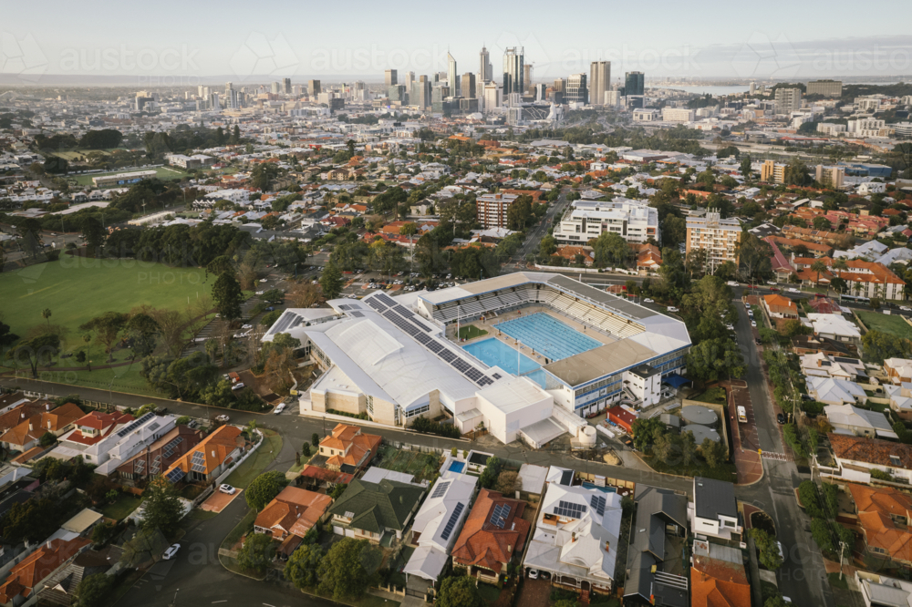 Aerial of Beatty Park Leisure Centre and Perth city skyline from North Perth in Western Australia - Australian Stock Image