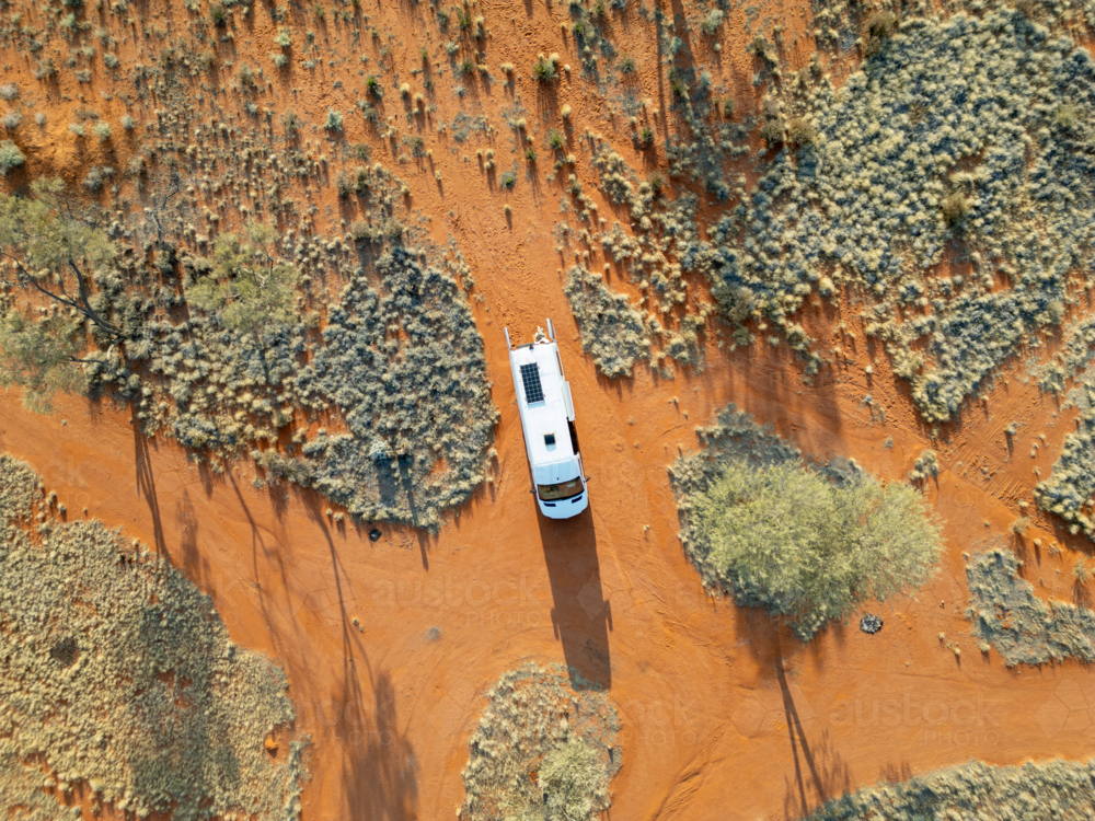 aerial of campervan parked in desert and bush rest area - Australian Stock Image