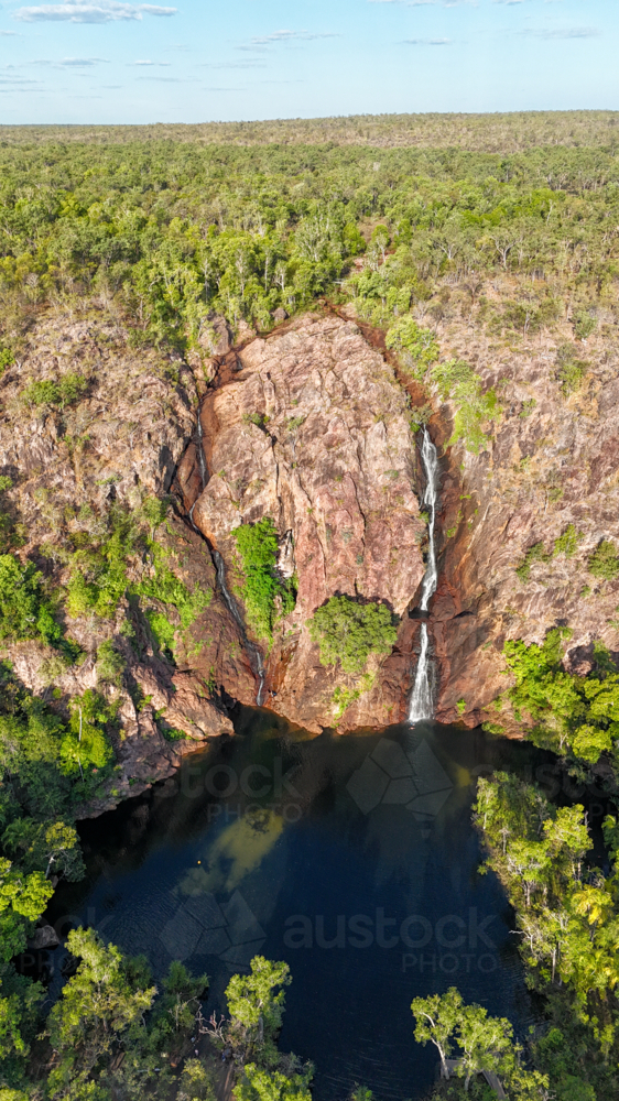 Aerial of two waterfalls leading to a swimming spot - Australian Stock Image