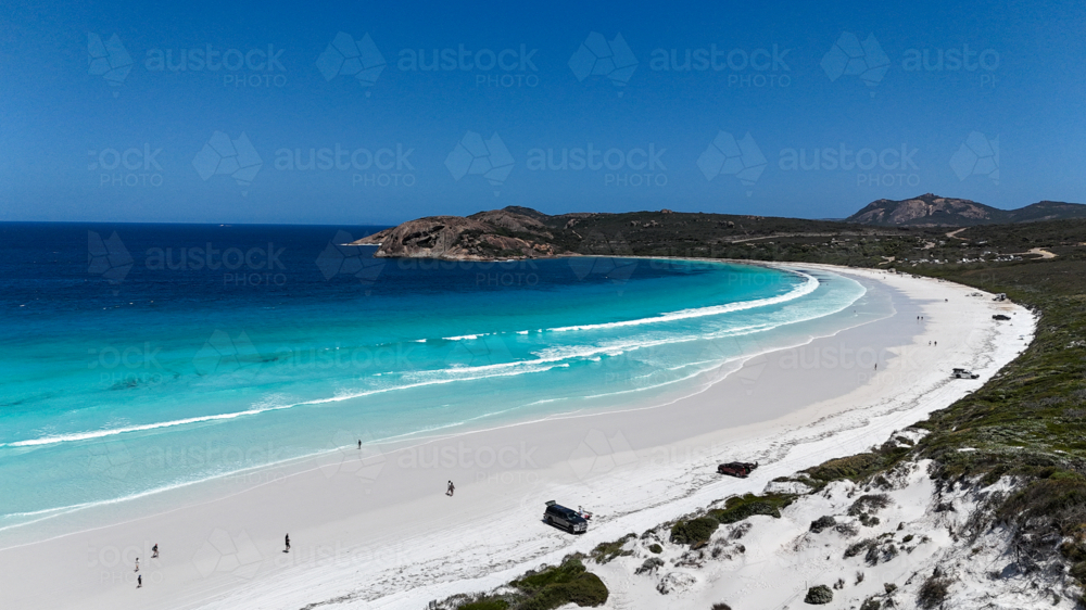 Aerial of white beach with cars and people on it - Australian Stock Image