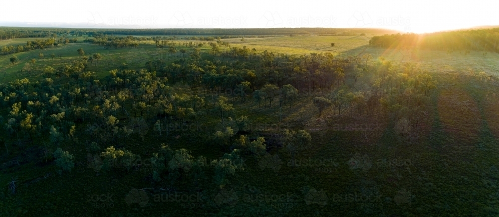 Aerial panorama of a farm paddock at dusk. - Australian Stock Image
