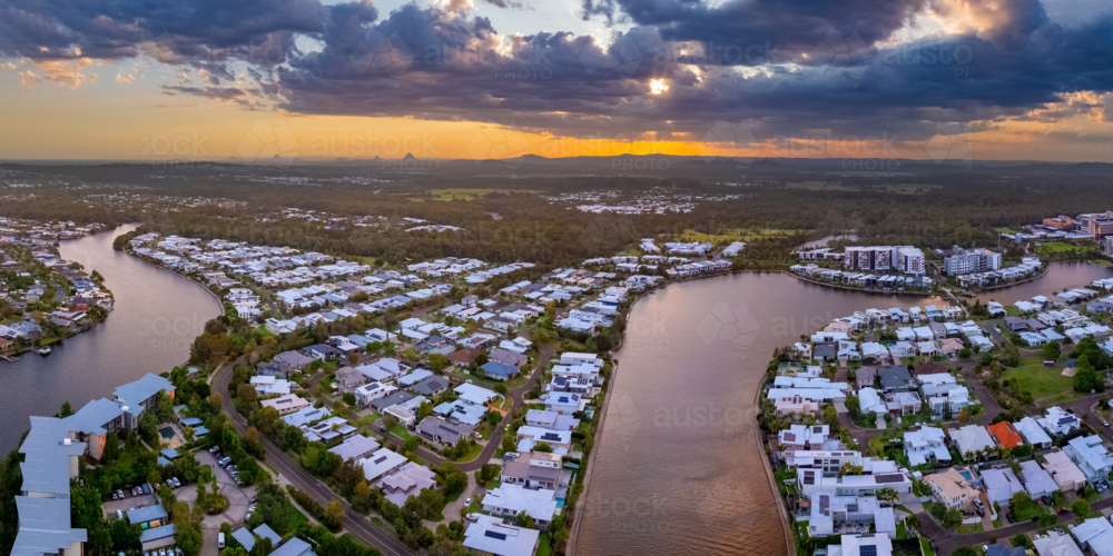 Aerial panorama of dramatic sky over canals and waterfront buildings - Australian Stock Image