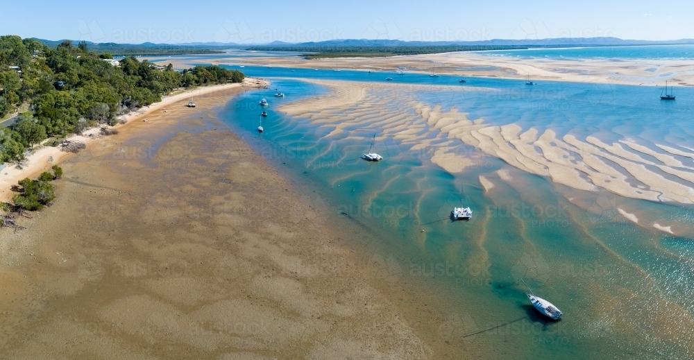 Image of Aerial panorama of Round Hill Creek and Bustard Bay, the Town of 1770, QLD. Austockphoto Image of Aerial panorama of Round Hill Creek and Bustard Bay, the Town of 1770, QLD. Austockphoto