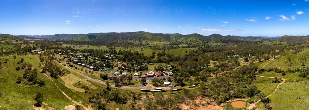 Panoramic Aerial View Rural Image of Aerial Panorama shot of rural area with houses and mountains ...