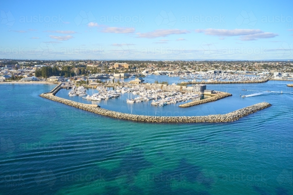 Aerial shot of Fremantle's Challenger Harbour on a sunny day with boats, yachts and groyne - Australian Stock Image