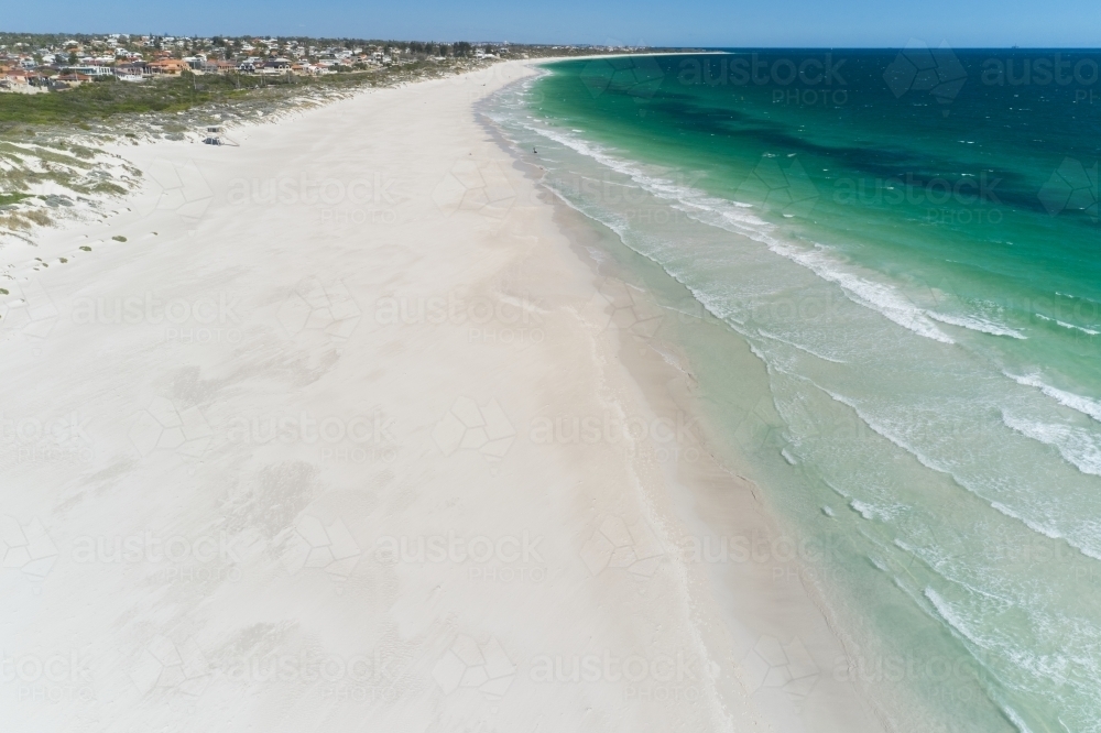 Aerial shot of the sandy beach and water at Mullaloo Beach in Perth, Western Australia - Australian Stock Image