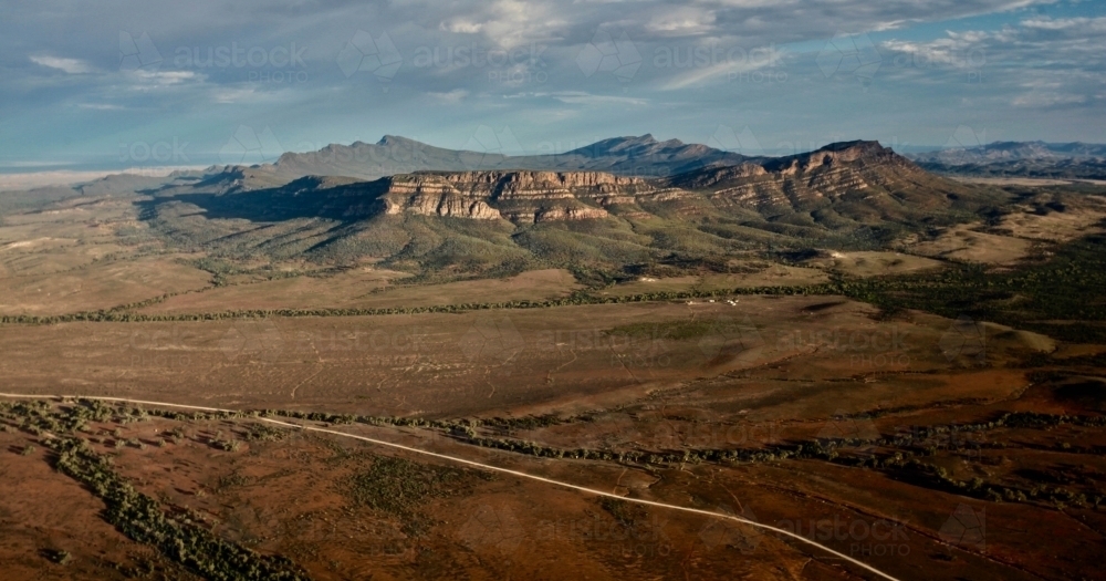 Aerial shot, Wilpena Pound, Flinders Ranges, early morning light - Australian Stock Image