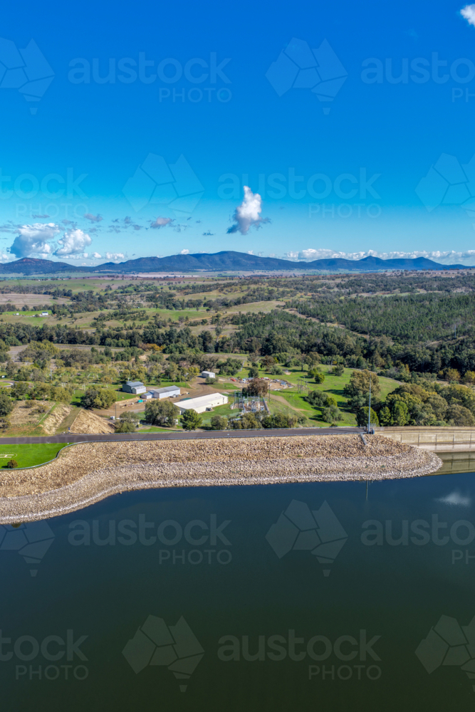 Aerial vertical view showcasing the Lake Keepit dam wall, engineering infrastructure and surrounds - Australian Stock Image