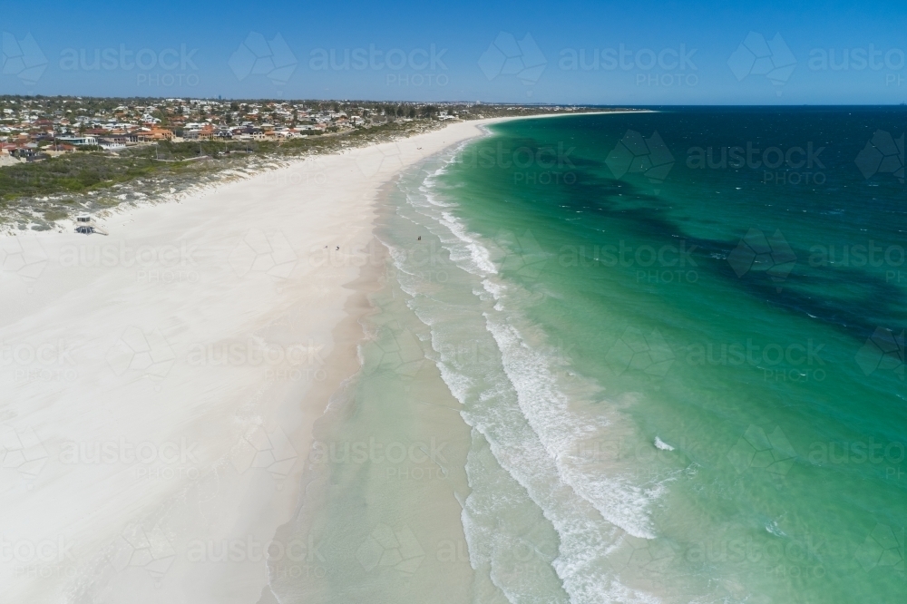 Aerial view along the waves and sand at Mullaloo Beach in Perth, Western Australia - Australian Stock Image