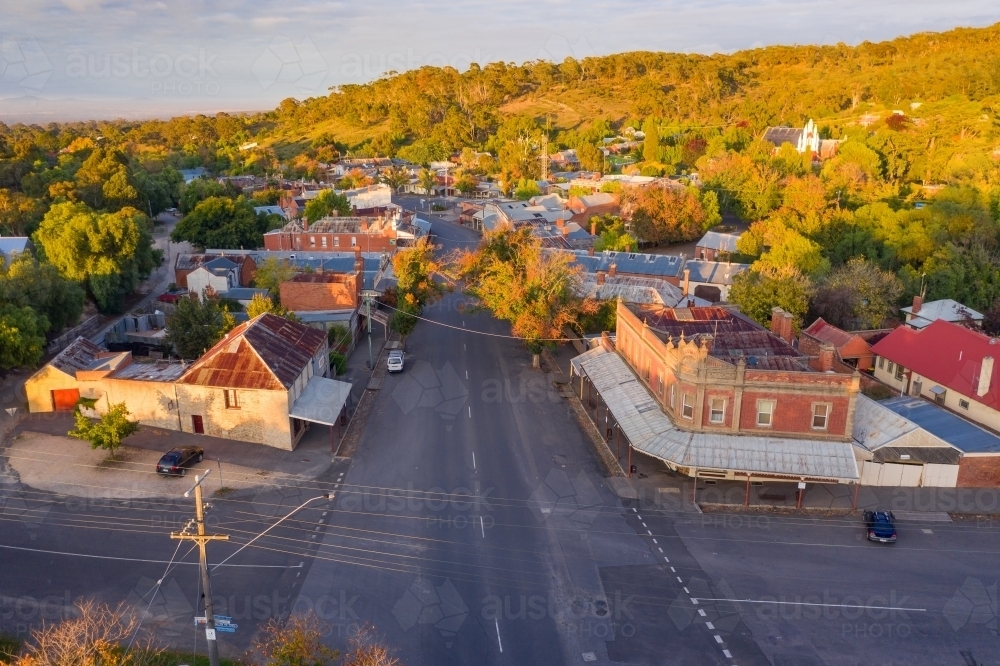 Aerial view down the main street of a country town full of historic buildings - Australian Stock Image