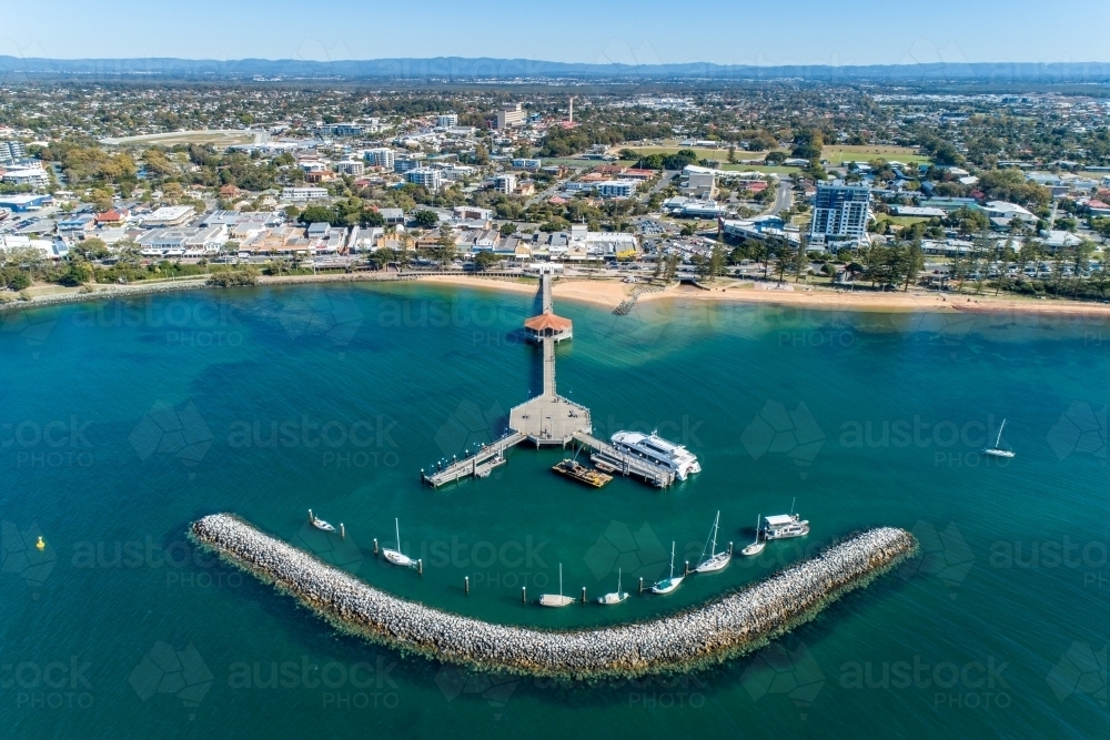 Aerial view looking back over Redcliffe Pier and Redcliffe. - Australian Stock Image
