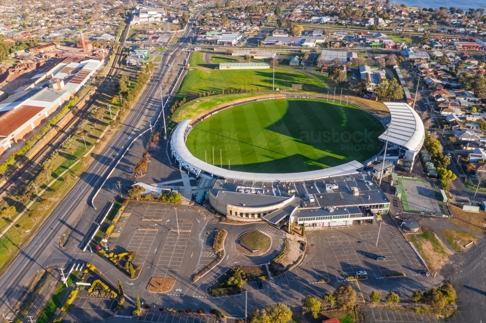 Aerial view of a AFL football stadium with surrounding vacant car park - Australian Stock Image