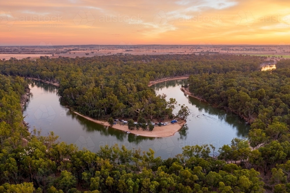 Image of Aerial view of a bend on the Murray River at sunrise ...