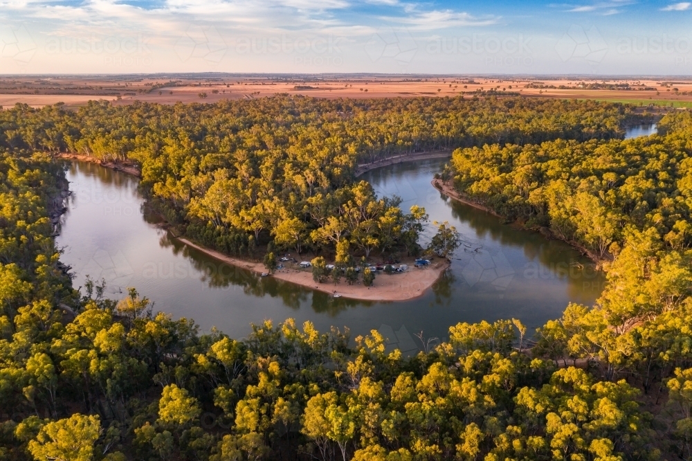Aerial view of a bend on the Murray River early in the morning - Australian Stock Image