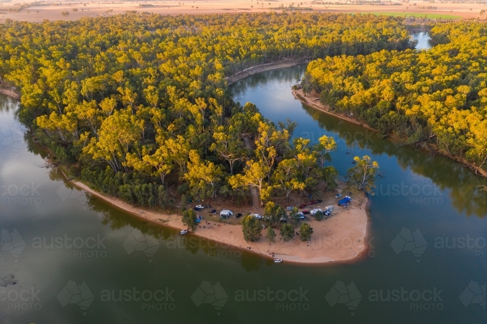 Aerial view of a bend on the Murray River early in the morning - Australian Stock Image