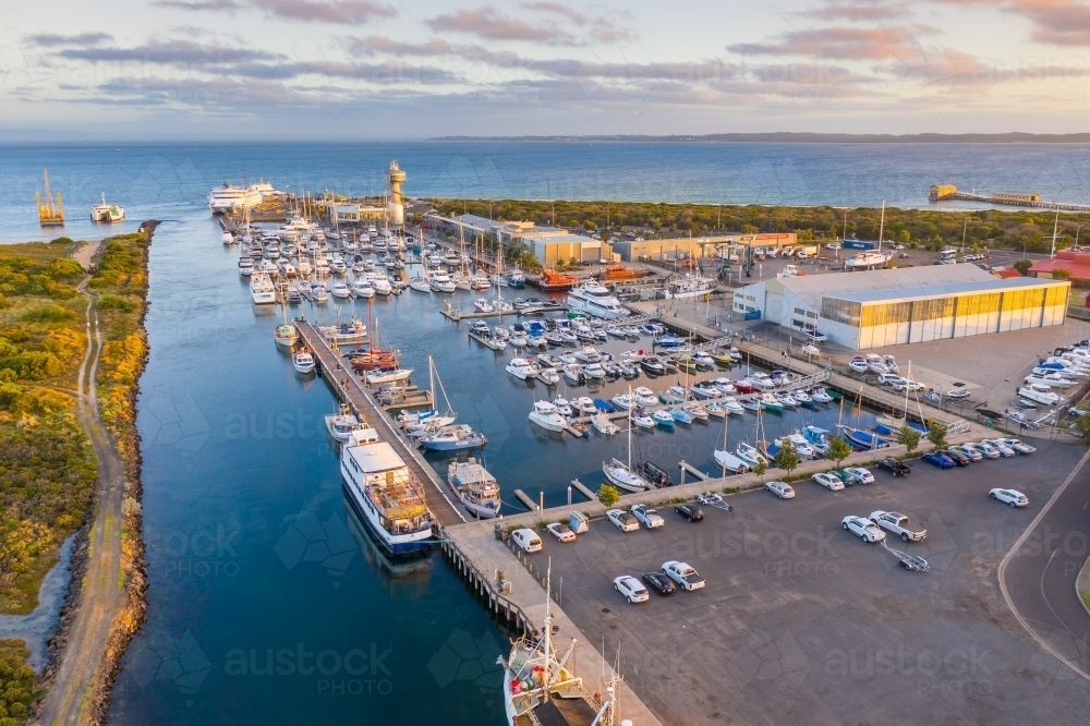 Image of Aerial view of a boats and yachts anchored at a coastal marina ...