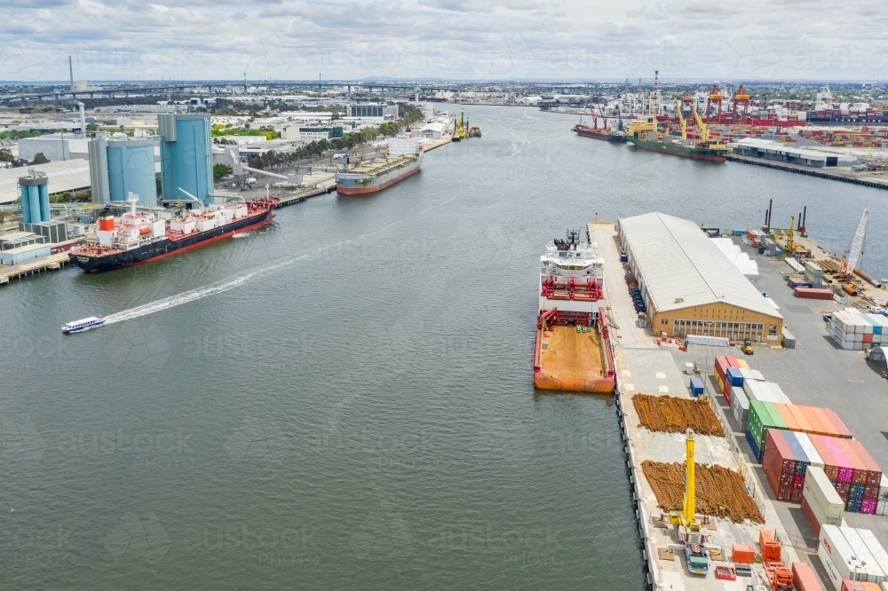 Aerial view of a busy wharf area where two waterways merge - Australian Stock Image