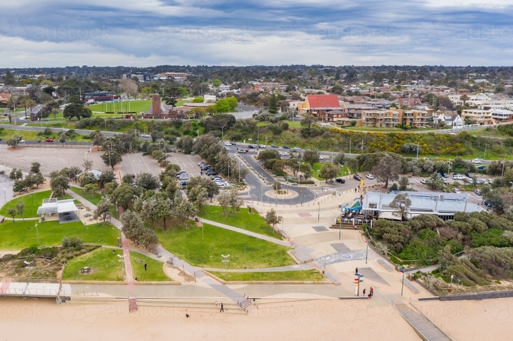 Aerial view of a car park and a large coastal reserve at the beach - Australian Stock Image