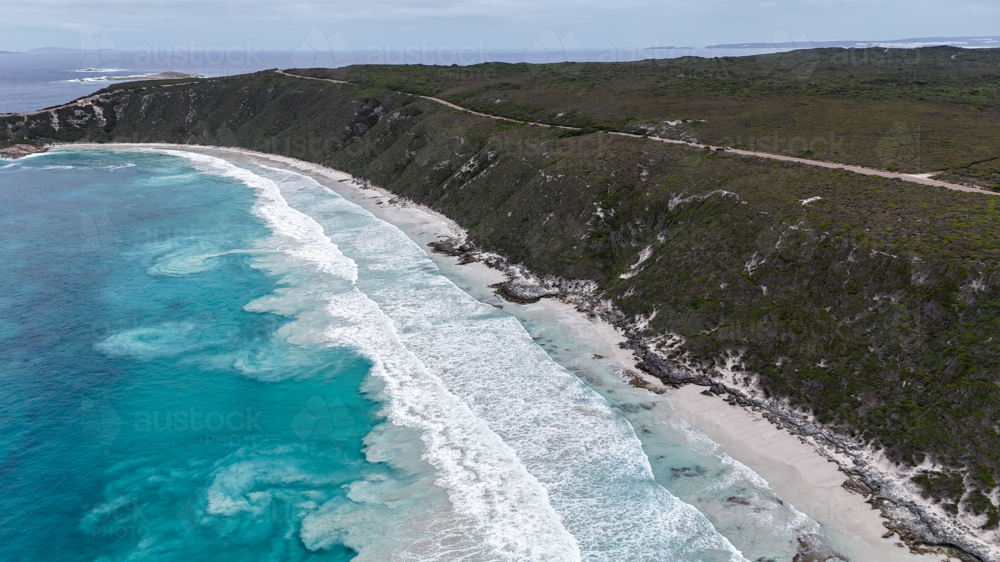 Aerial view of a coastal landscape with a long stretch of rugged cliffs - Australian Stock Image