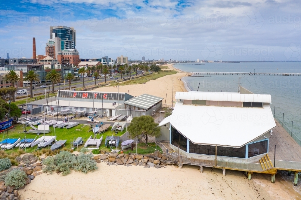 Aerial view of a coastal yacht club over a beach - Australian Stock Image
