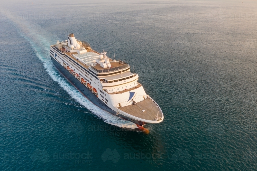 Aerial view of a cruise ship out on the ocean - Australian Stock Image