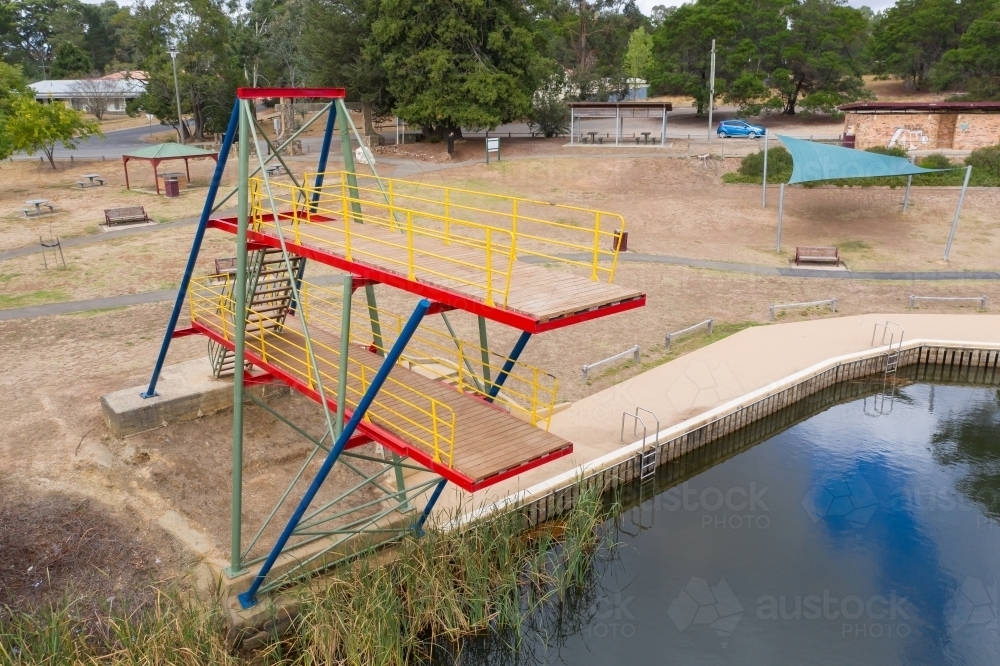 Aerial view of a double level diving platform over a lake - Australian Stock Image