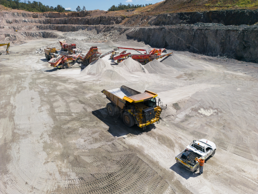 Aerial view of a dump truck in a quarry. - Australian Stock Image