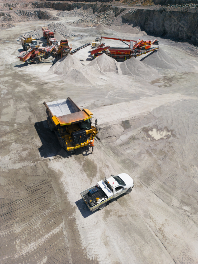 Aerial view of a dump truck in a quarry. - Australian Stock Image